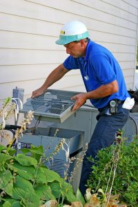 air-conditioner-being-worked-on