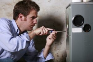 furnace-with-man-working-on-it